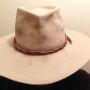@Wolfefan well.. I can ugh ten and loosen easily. Lots of hats have glue on the after market bands. I tagged this one