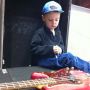 Helping daddy change strings. 