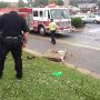 Impact threw the storm drain cover 20 feet into the street. Holy cow! 